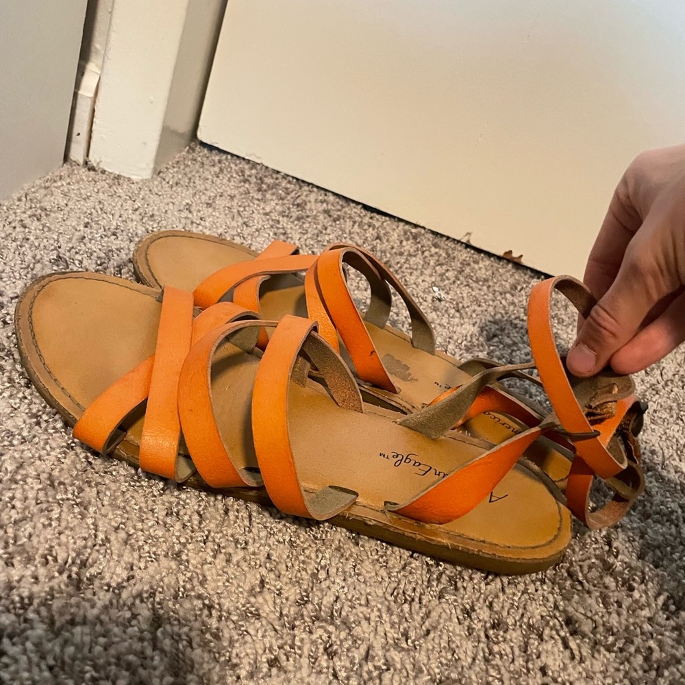 Orange strappy sandals